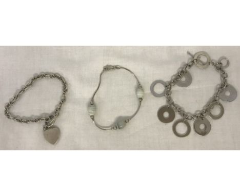 3 ladies silver bracelets. T bar bracelet with heart charm, snake chain bracelet with white agate beads and a t bar bracelet 