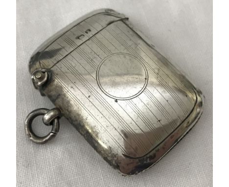 A silver vesta case with empty cartouche and engine turned decoration. Hallmarked Birmingham 1949. Total weight 17.5 g.