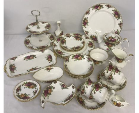 A quantity of Royal Albert "Old Country Roses" ceramics. Comprising; 4 dinner plates, 4 cake plates, 4 bowls, 4 cups & saucer