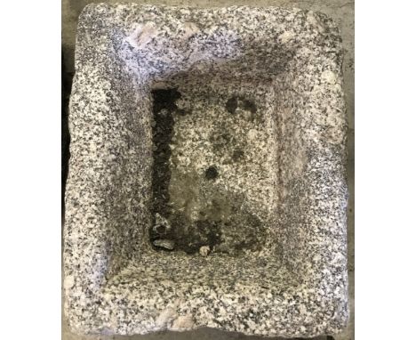 A heavy granite trough/planter.  Approx. 35cm x 30cm x 17.5cm tall.