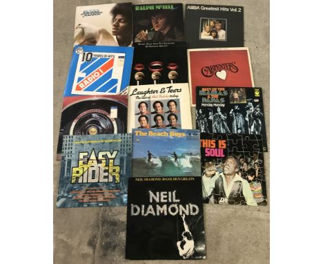 A collection of vintage vinyl records to include Abba, The Beach Boys & Michael Jackson.  