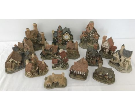 A collection of 13 David Winter cottages and houses together with one other set with a clock. To include Hertford Court, Squi
