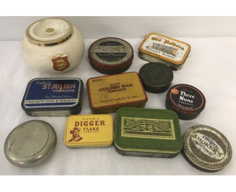 A ceramic lidded tobacco with Royal Arms of England crest. Together with a quantity of vintage tobacco tins. 