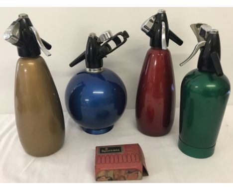 A box of vintage soda siphons.  