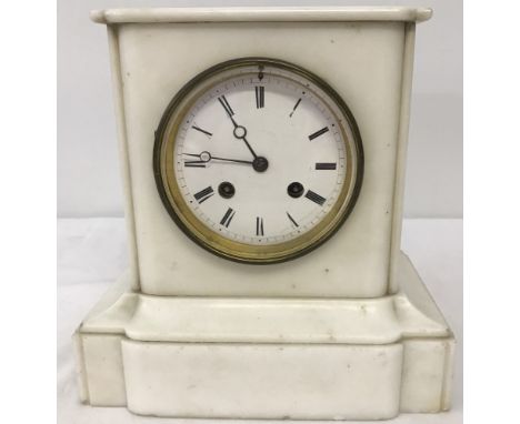 A vintage white marble mantel clock with enamelled face. Complete with pendulum but no key. Approx. 22cm tall.