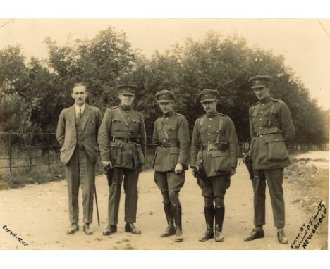 1922 Photograph of Michael Collins with Free State, National Army officers. A photograph of a group of five men, one in civil