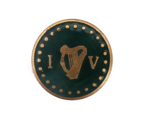 Irish Volunteers brass and enamel pin. A brass and enamel Irish Volunteers lapel badge by P Quinn, Belfast. Diameter 1in. (2.