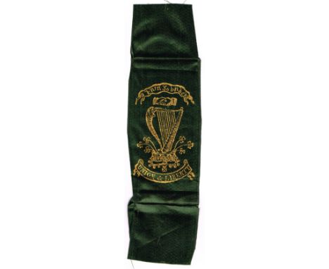 Circa 1798. United Irishmen ribbon badge. Gold stamped on green cloth: "Erin go brach" handshake over harp with inverted crow