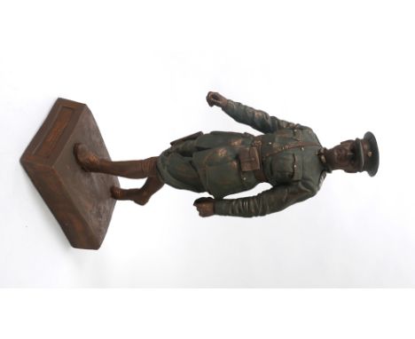 Figure of Michael Collins. A polychrome, cast-resin figure of Michael Collins in the uniform ogf the Commander-in-Chief of th