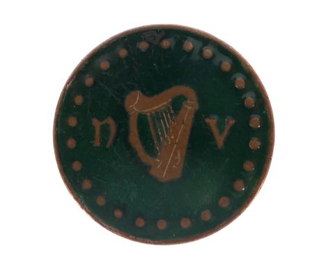 National Volunteers brass and enamel pin. A brass and green enamel circular lapel badge, by P Quinn, Belfast. Diameter 1in. (