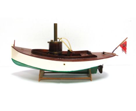 A MODEL STEAM BOAT  of principally wood construction, with a varnished deck, the hull painted white over green, fitted with a