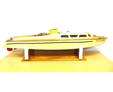 A BASSETT-LOWKE LIVE STEAM FAST MOTOR BOAT, 'STREAMLINIA'  circa 1938, restored in cream with plank effect decking, fitted wi