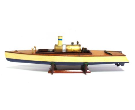 A MODEL STEAM LAUNCH  with a plank effect deck, the hull repainted cream over blue, containing an unsecured single cylinder e