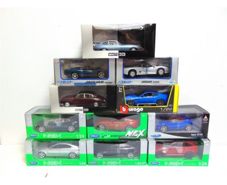 ELEVEN 1/24 SCALE DIECAST MODEL JAGUAR CARS  by Welly (8), White Box (2), and Bburago (1), each mint or near mint and boxed. 