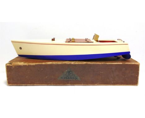 A KELLNER SPEED-BOAT,  the hull painted cream over blue, fitted with an electric motor (untested), 66cm long, boxed. Conditio