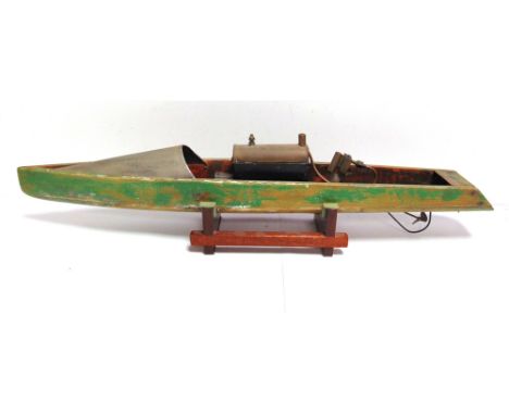 A BOWMAN LIVE-STEAM SPEED-BOAT  with a part-stripped green hull, fitted with a single cylinder engine, 69cm long, unboxed.