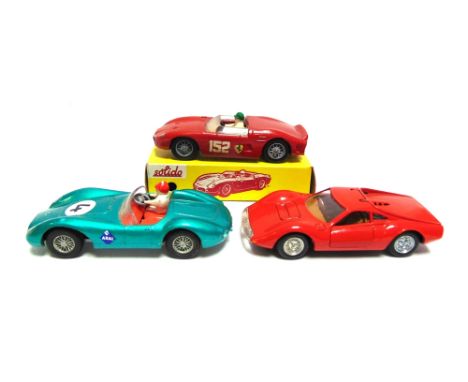 THREE ASSORTED DIECAST MODEL VEHICLES  circa 1960s-70s, comprising a Solido No.129, Ferrari 2L5, red, racing number 152, near