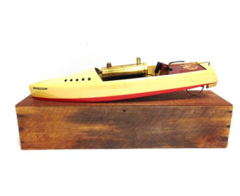 A HOBBIES BOWMAN SPEED-BOAT, 'SWALLOW'  the hull painted cream over red, fitted with a single cylinder engine, generally good
