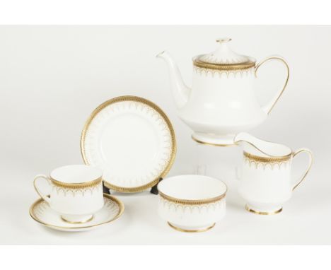 PARAGON 'ATHENA' PATTERN WHITE CHINA TEA SERVICE WITH PRINTED AND GILT AND BLUE BANDED BORDERS, ORIGINALLY FOR SIXTEEN PERSON