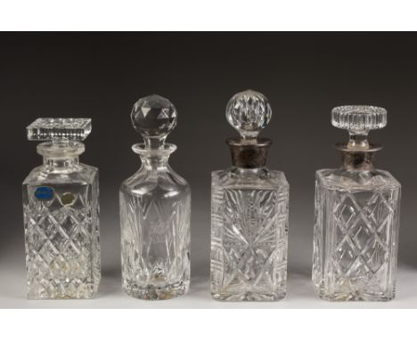 TWO CUT GLASS SQUARE SPIRIT DECANTERS, both with hallmarked silver clad necks and the stoppers, a  BOHEMIAN CRYSTAL GLASS SPI