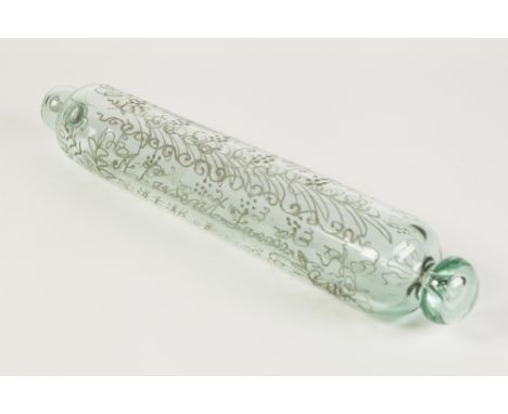 VICTORIAN NAILSEA TYPE SOUVENIR CLEAR GLASS ROLLING PIN, of typical form with wheels cut decoration and inscription: 'A Prese