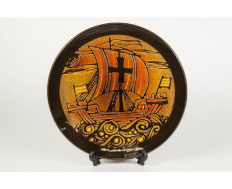 MODERN POOLE POTTERY WALL PLAQUE, DESIGN OF GALLEON IN FULL SAIL, entitled verso 'Aegean', 13 3/4" (35cm) diameter 