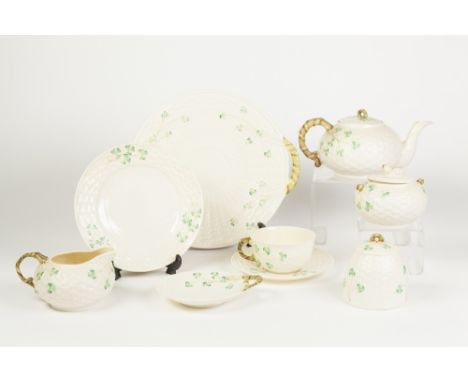 TWENTY TWO PIECE BELLEEK SHAMROCK PATTERN PORCELAIN TEA SERVICE FOR SIX PERSONS, comprising: TEAPOT, MILK JUG, SUCRIER AND CO