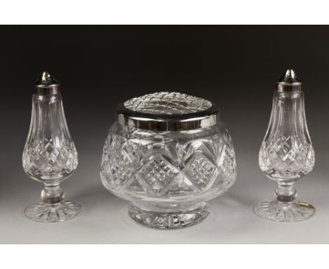 A PAIR OF WATERFORD CUT GLASS PEDESTAL PEPPER  AND SALTS with EP pull off lids and a WATERFORD CUT GLASS ROSE BOWL with EP gr