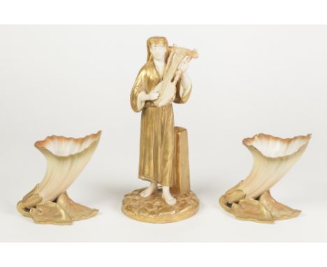ROYAL WORCESTER PORCELAIN FIGURE OF A MIDDLE EASTERN GIRL IN GILT COSTUME PLAYING A LYRE SHAPED INSTRUMENT, her head dress pe