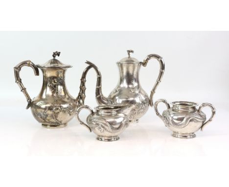 Chinese Export silver composite tea service, comprising a matches set of two teapots, both by Zeewo Shanghai, the tallest 21 