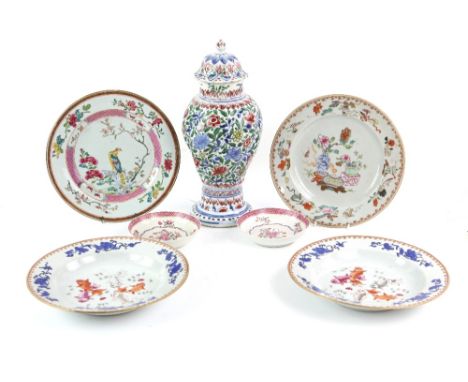 Seven pieces of Chinese Export, or similar, porcelain, including: a pair of famille rose plates, decorated with fan-tailed go