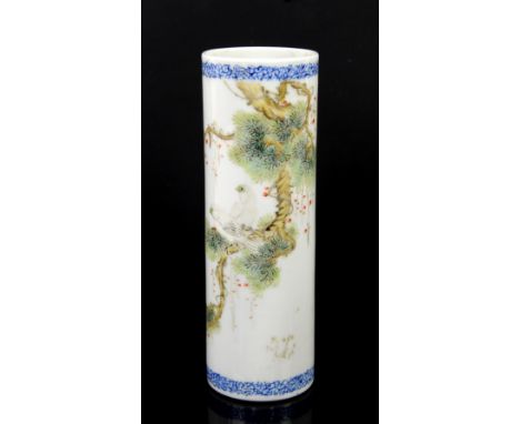 A polychrome porcelain bitong of cylindrical form; decorated with a pair of birds perched in a tree; the base with Qianlong s