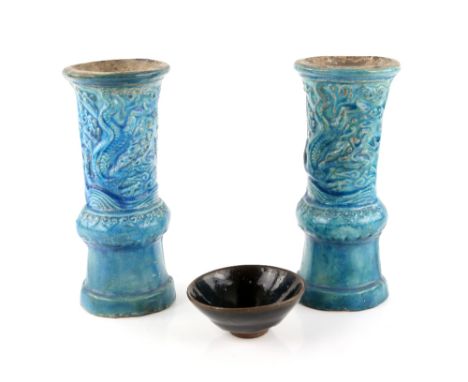 A small Chian-yao style conical bowl with black glaze ending irregularly above the foot, 9.5 cm diameter; together with a pai