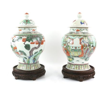AMENDED DESCRIPTION: A pair of polychrome enamel Chinese vases; each one with domed cover and knop finial, decorated with nar