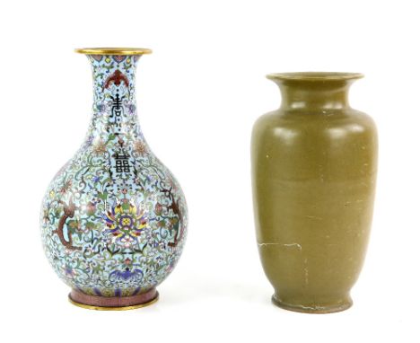 A Chinese teadust style vase with trumpet neck and tapering, cylindrical body, 26 cm high, the base with Qianlong six-charact