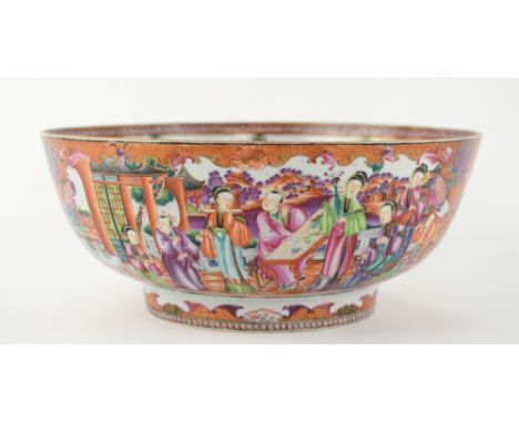 An elegant famille rose punch bowl, decorated with panels depicting Manchu/Chinese families; 33.5 cm diameter, Qianlong. Prov