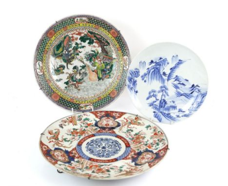 A Japanese Imari dish, 41 cm diameter, Meiji Period; together with a blue and white dish, decorated with a mountainous landsc