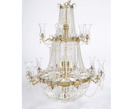 A fine fifteen branch cut glass chandelier 20th Century
Of tiered pear shape form each roundel stamped with pendant hare bell