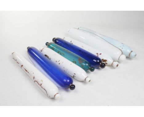 A collection of eight Victorian glass rolling pins
Comprising two Bristol Blue examples 38cms, a white opaque glass rolling p