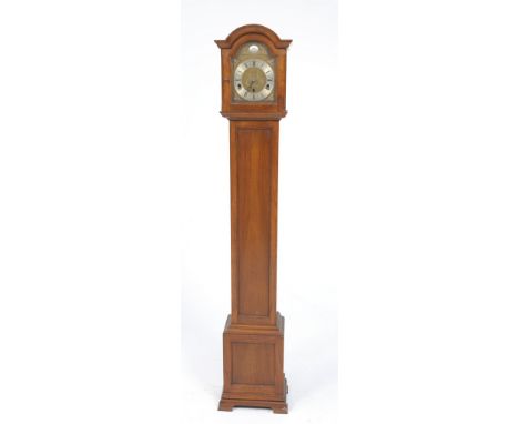 A 20th Century mahogany grandaughter longcase clock
With a 16cm brass and silvered dial signed Elliott and engraved Frodsham,