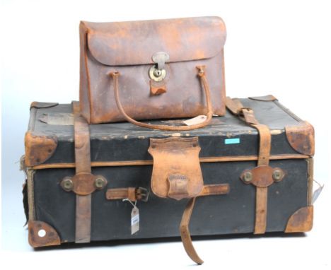 A Vintage canvas and leather trunk, Finnigans
Of rectangular hinged form with leather angles and white Cunard  White Star lab