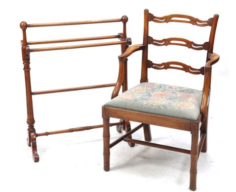 A Victorian mahogany towel airer
With trumpet and sphere finials with out swept arms joined by plain spindles fluted upright 