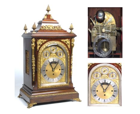 A good Victorian gilt brass mounted mahogany chiming table clock, "Dent London"
English circa 1880 with a 19cm dial signed on