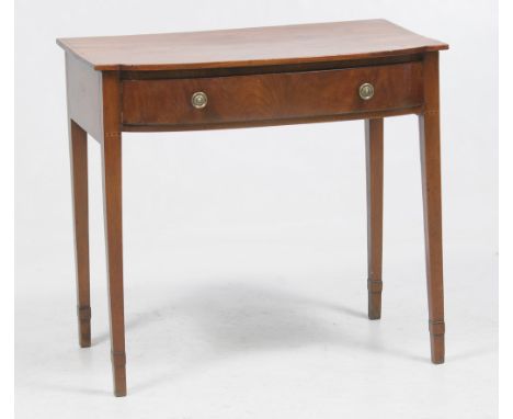 A 19th Century inlaid mahogany bowfront side table
With a frieze drawer, brass ring handles raised upon tapering legs inlaid 