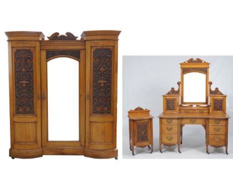 A Victorian satin walnut three piece bedroom suite
The impressive inverted bowfront wardrobe with a swan neck cresting above 