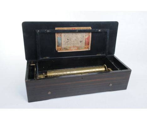 A cylinder musical box, Swiss circa 1880
The 33cm cylinder playing twelve airs as listed on tune sheet, printed P.V.F contain