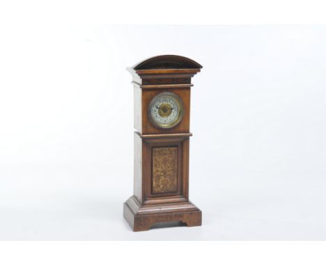 An Edwardian mahogany miniature longcase clock
With a 5cm white dial with Arabic numerals, spring driven movement contained w