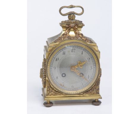 A gilt metal Pendule d'officier style gilt brass mantle clock early 20th Century
With a 10.5cm silvered dial signed in the ch