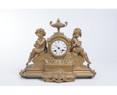 A 19th Century gilt spelter figural mantle clock
With a 8cm white enamel dial with Roman numerals, the two train eight day mo