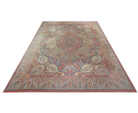 An Axminster Wilton Persian pattern carpet with a central rose medallion 
With guard stripes overall decorated with flowers a